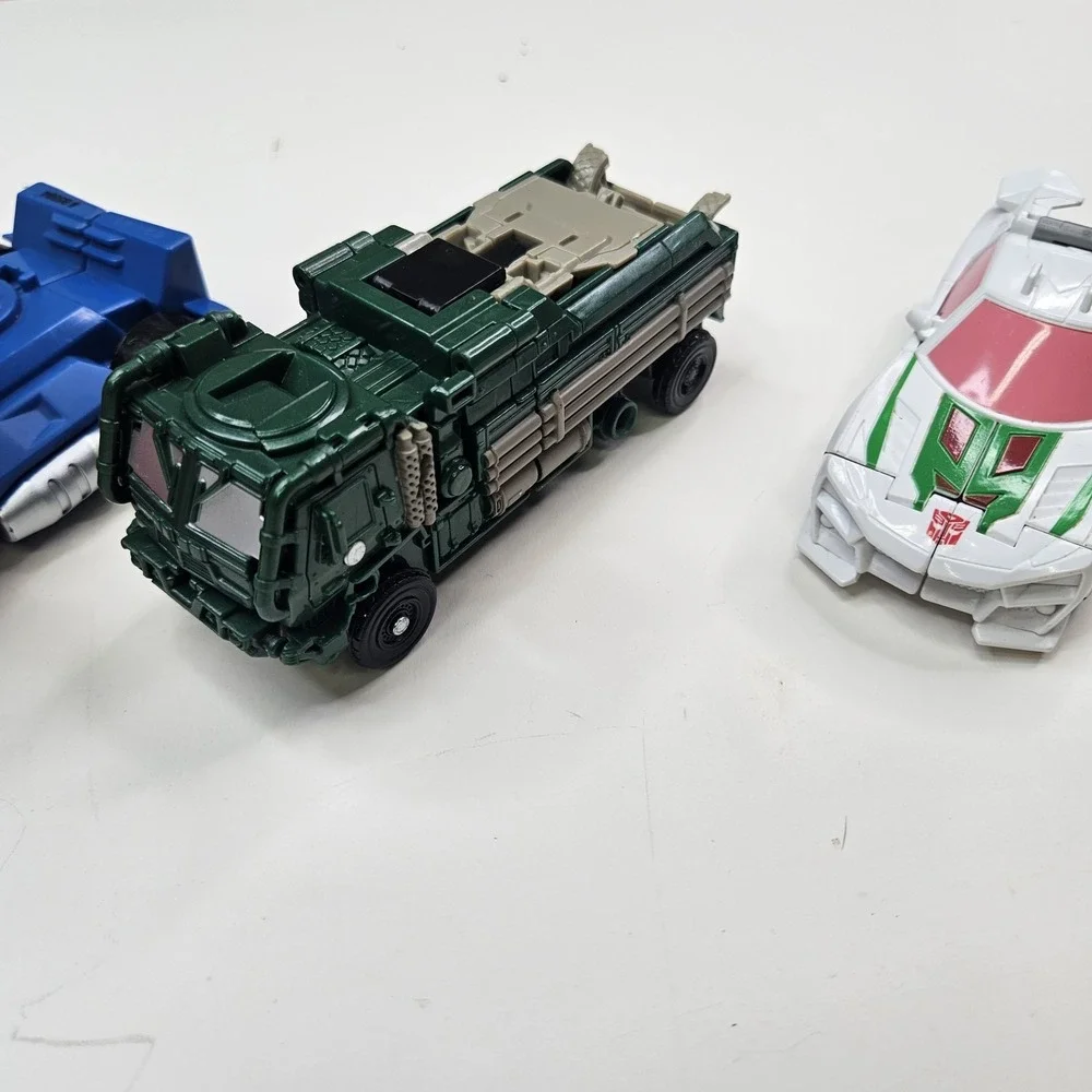 Lot of 5 Transformers Action Figures - Optimus Prime, Bumblebee & More